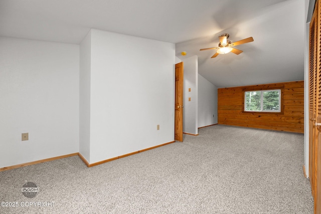1291 N Rainbow Park Dr, Wasilla, AK 99623 - bonus room with carpet flooring, a ceiling fan, wooden walls, and lofted ceiling