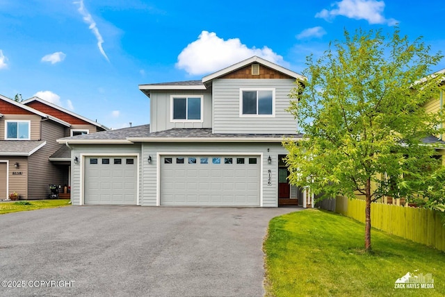 8126 Grayhawk Cir, Anchorage, AK 99507 - view of front of house with asphalt driveway, board and batten siding, a shingled roof, and an attached garage