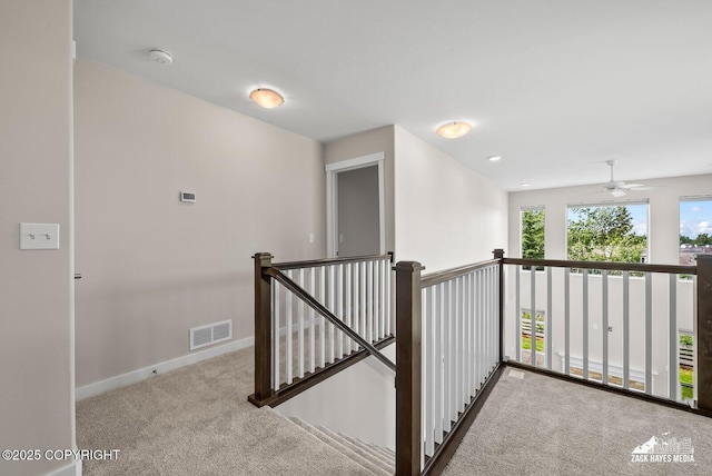 8126 Grayhawk Cir, Anchorage, AK 99507 - hallway with carpet flooring and an upstairs landing