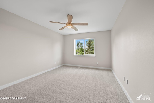 8126 Grayhawk Cir, Anchorage, AK 99507 - carpeted empty room with ceiling fan and baseboards