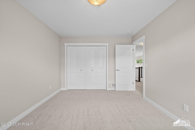 8126 Grayhawk Cir, Anchorage, AK 99507 - unfurnished bedroom with carpet and a closet