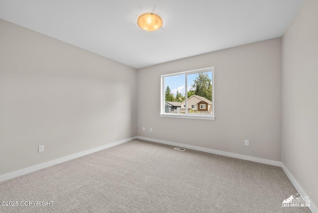 8126 Grayhawk Cir, Anchorage, AK 99507 - unfurnished room with carpet flooring and baseboards