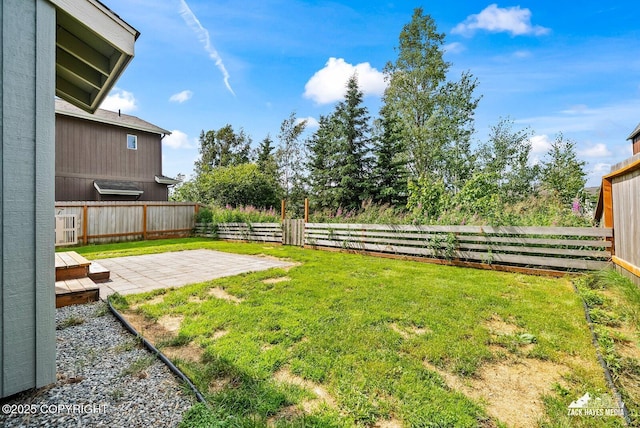8126 Grayhawk Cir, Anchorage, AK 99507 - fenced backyard with a patio