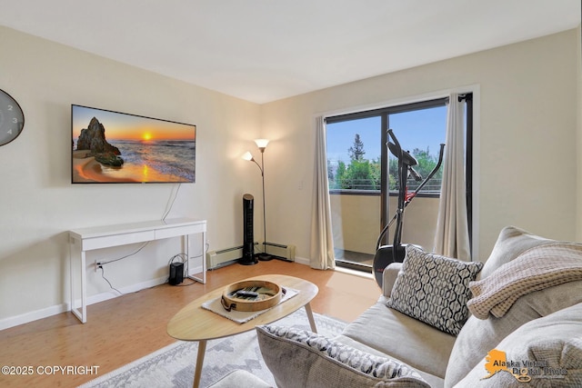 1201 Denali St Unit 210, Anchorage, AK 99501 - living room featuring wood finished floors and a baseboard heating unit