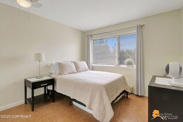 1201 Denali St Unit 210, Anchorage, AK 99501 - bedroom with light wood finished floors