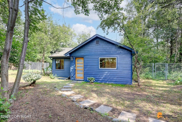 2641 W 27th Ave, Anchorage, AK 99517 - rear view of house with a gate