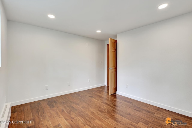 2641 W 27th Ave, Anchorage, AK 99517 - empty room featuring dark wood-style flooring and recessed lighting