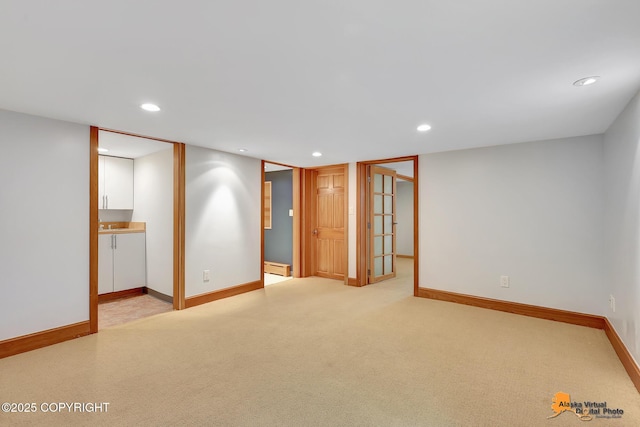 2641 W 27th Ave, Anchorage, AK 99517 - finished basement featuring recessed lighting, a baseboard radiator, and carpet flooring