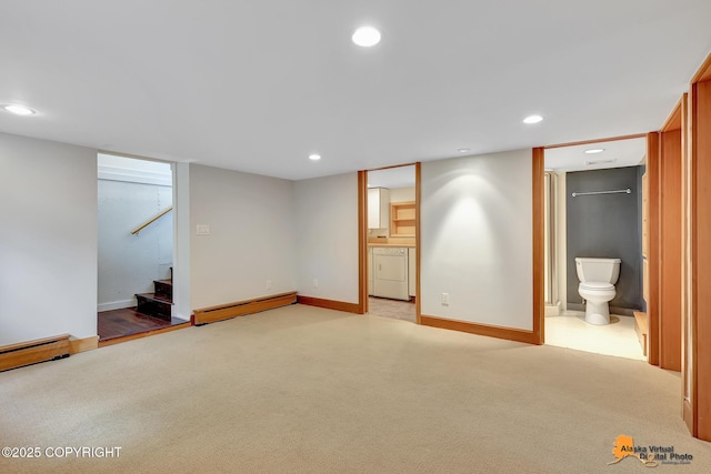 2641 W 27th Ave, Anchorage, AK 99517 - finished basement featuring baseboard heating, washer / dryer, recessed lighting, light colored carpet, and stairs