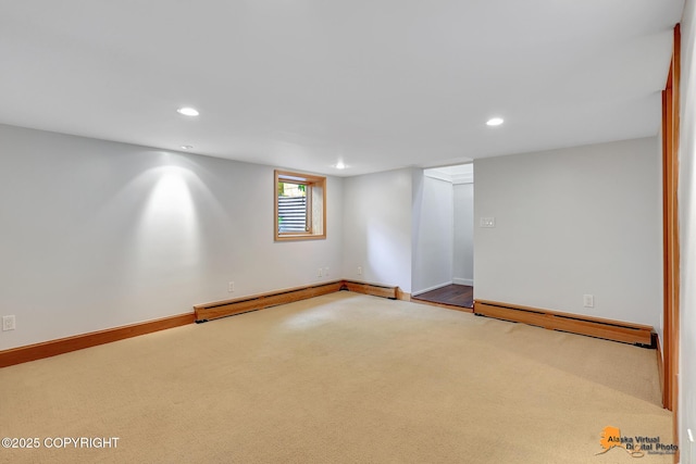 2641 W 27th Ave, Anchorage, AK 99517 - unfurnished room featuring a baseboard heating unit, a baseboard radiator, recessed lighting, and carpet floors