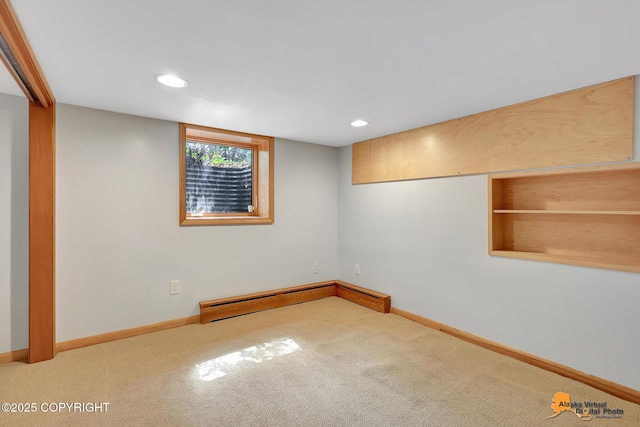 2641 W 27th Ave, Anchorage, AK 99517 - basement with baseboard heating, carpet, and recessed lighting