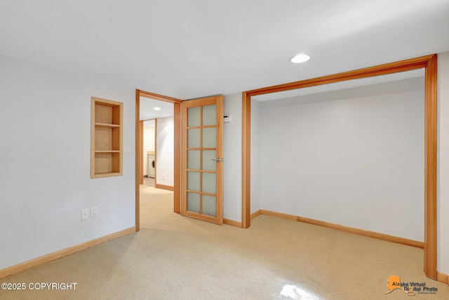 2641 W 27th Ave, Anchorage, AK 99517 - carpeted empty room with recessed lighting, washer / clothes dryer, and built in shelves