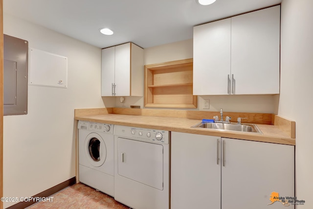 2641 W 27th Ave, Anchorage, AK 99517 - washroom featuring separate washer and dryer, cabinet space, electric panel, recessed lighting, and bar with sink