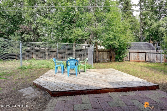 2641 W 27th Ave, Anchorage, AK 99517 - wooden terrace featuring a fenced backyard