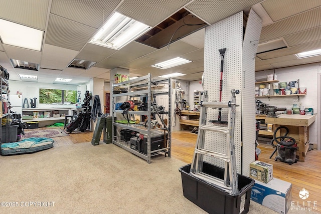 22432 Glacier View Dr, Eagle River, AK 99577 - workout area featuring a workshop area and wood finished floors