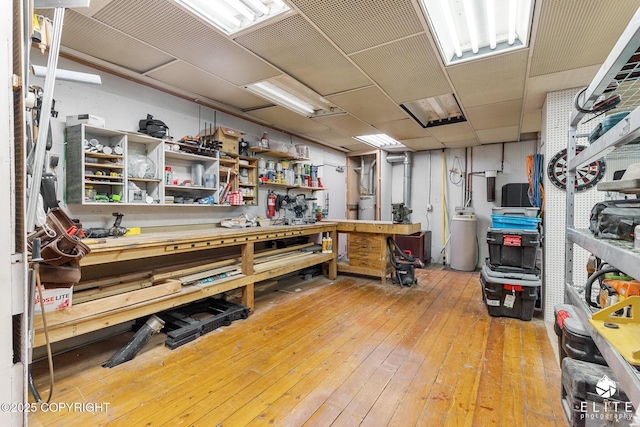 22432 Glacier View Dr, Eagle River, AK 99577 - miscellaneous room with a workshop area and hardwood / wood-style flooring