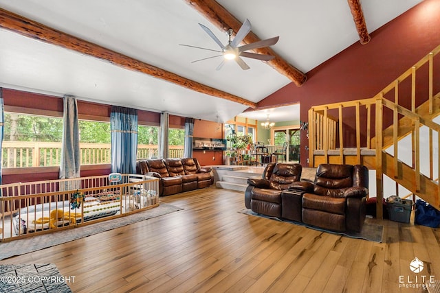 22432 Glacier View Dr, Eagle River, AK 99577 - living room featuring a ceiling fan, a chandelier, and wood finished floors