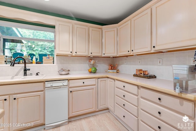 22432 Glacier View Dr, Eagle River, AK 99577 - kitchen featuring backsplash, light countertops, and light wood finished floors
