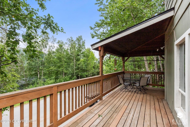 22432 Glacier View Dr, Eagle River, AK 99577 - wooden terrace featuring outdoor dining area