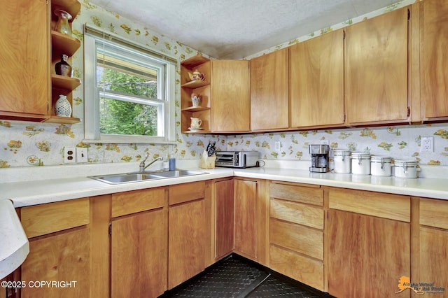 4905 Roger Dr, Anchorage, AK 99507 - kitchen with open shelves, a textured ceiling, light countertops, and wallpapered walls