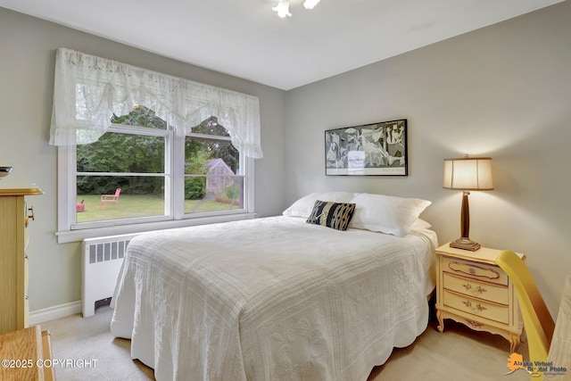 4905 Roger Dr, Anchorage, AK 99507 - bedroom featuring radiator heating unit and carpet flooring