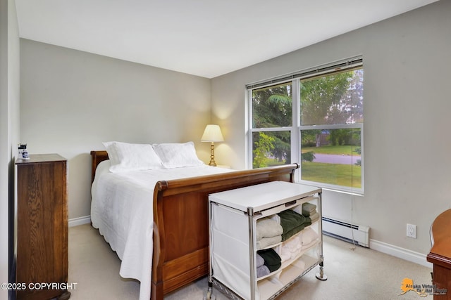 4905 Roger Dr, Anchorage, AK 99507 - bedroom with baseboard heating and light carpet
