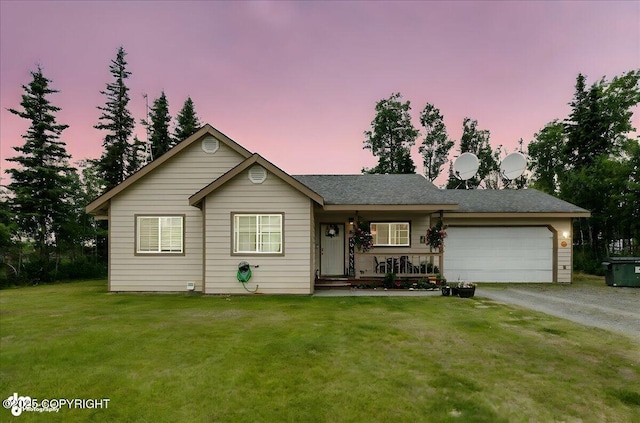 34443 Matanuska St, Soldotna, AK 99669 - ranch-style home with an attached garage, driveway, a front lawn, a porch, and a shingled roof