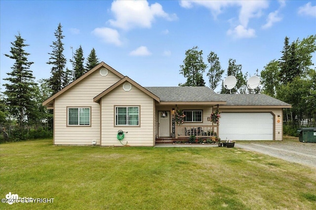 34443 Matanuska St, Soldotna, AK 99669 - ranch-style house featuring driveway, an attached garage, a front lawn, a porch, and roof with shingles