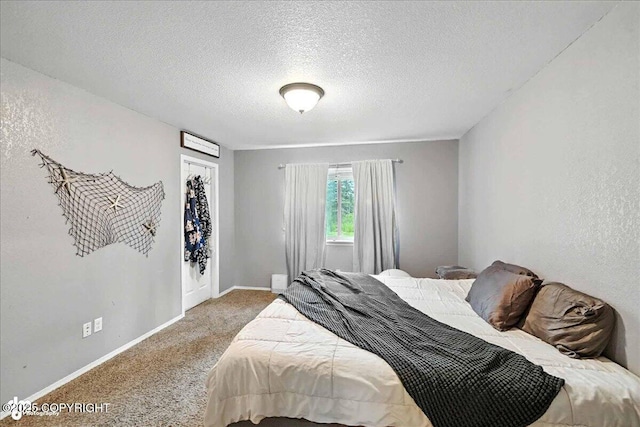 34443 Matanuska St, Soldotna, AK 99669 - bedroom featuring carpet flooring and a textured ceiling