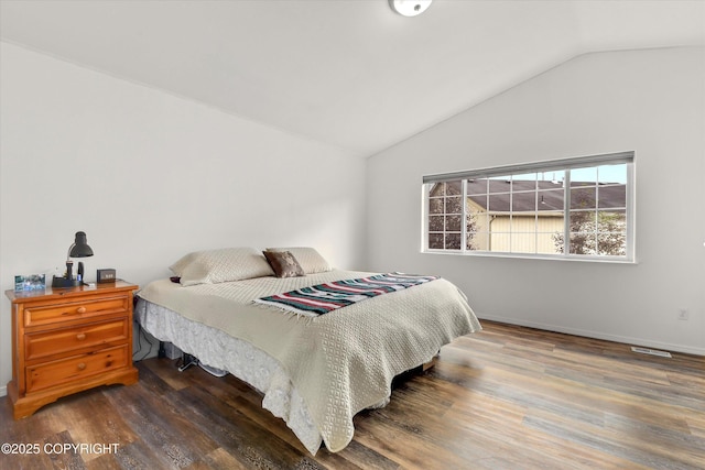 5586 Sapphire Loop # 55B, Anchorage, AK 99504 - bedroom with vaulted ceiling and wood finished floors