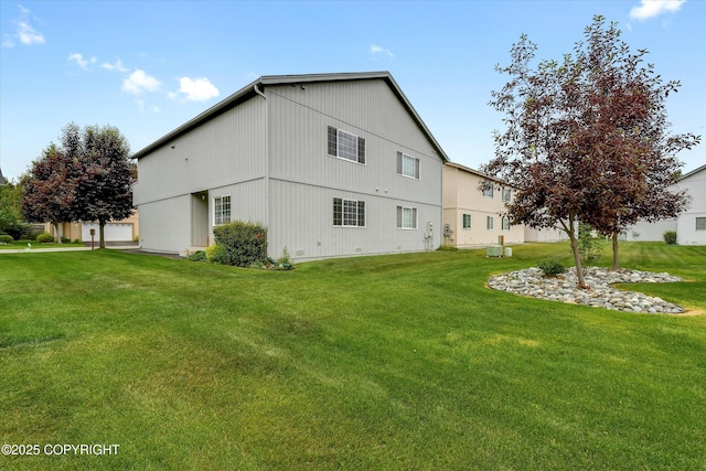 5586 Sapphire Loop # 55B, Anchorage, AK 99504 - view of side of property featuring a lawn