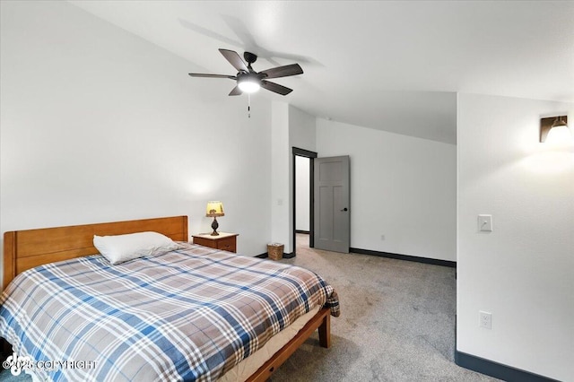 5551 N Wildwood Dr, Wasilla, AK 99654 - carpeted bedroom featuring vaulted ceiling and a ceiling fan