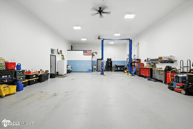 5551 N Wildwood Dr, Wasilla, AK 99654 - garage with a workshop area and ceiling fan