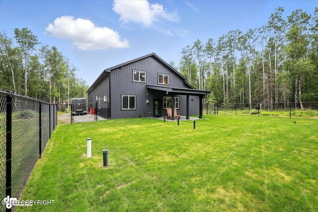 5551 N Wildwood Dr, Wasilla, AK 99654 - back of property featuring a fenced backyard