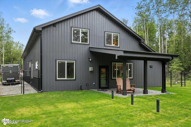 5551 N Wildwood Dr, Wasilla, AK 99654 - rear view of property featuring a patio and a gate