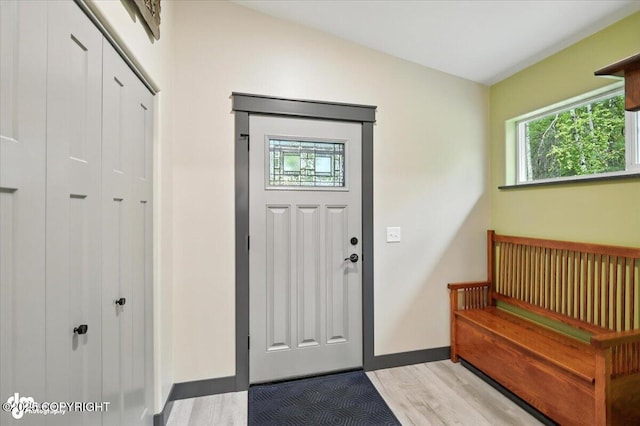 5551 N Wildwood Dr, Wasilla, AK 99654 - foyer entrance with light wood-type flooring and baseboards