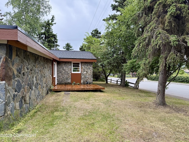 290 Park St, Anchorage, AK 99508 - view of green lawn with a deck