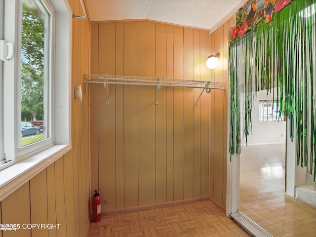 9801 Whitefish Cir, Anchorage, AK 99515 - spacious closet featuring vaulted ceiling