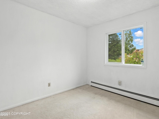 9801 Whitefish Cir, Anchorage, AK 99515 - carpeted spare room featuring baseboard heating and baseboards