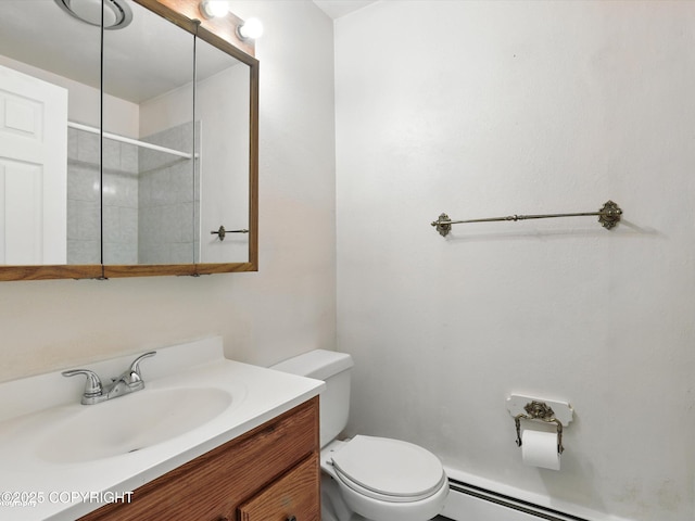 9801 Whitefish Cir, Anchorage, AK 99515 - bathroom with vanity, tiled shower, and baseboard heating