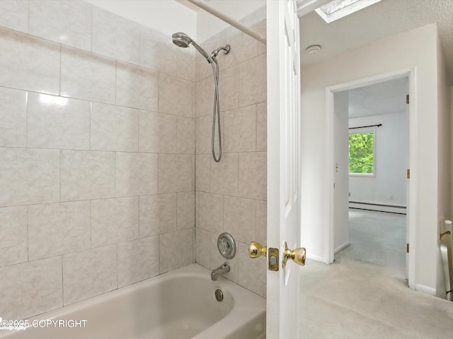 9801 Whitefish Cir, Anchorage, AK 99515 - bathroom featuring a baseboard heating unit and shower / washtub combination