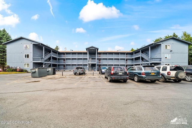 8641 Blackberry St # 6B, Anchorage, AK 99502 - view of building exterior with uncovered parking