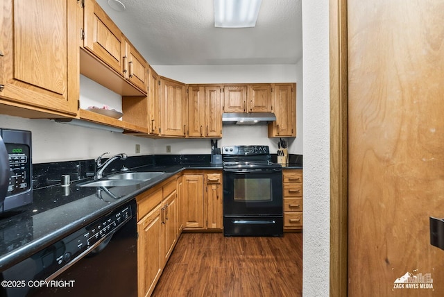 8641 Blackberry St # 6B, Anchorage, AK 99502 - kitchen with black appliances, under cabinet range hood, dark wood-type flooring, open shelves, and brown cabinets
