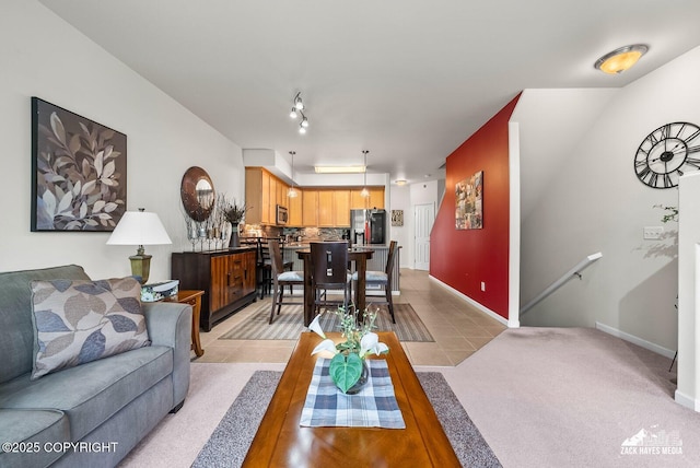 7655 Stepping Stone Ln Unit Q2, Anchorage, AK 99504 - living room with light tile patterned floors and baseboards