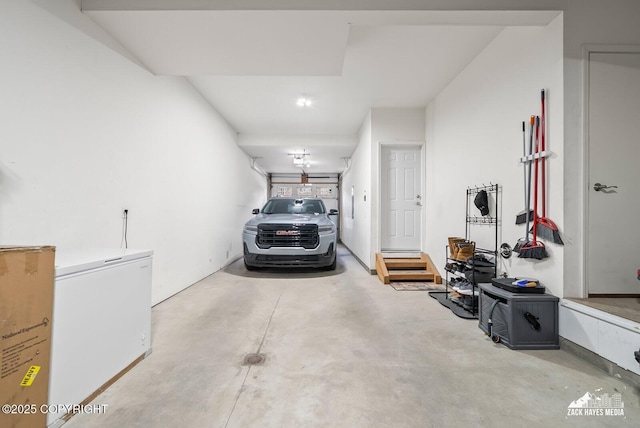 7655 Stepping Stone Ln Unit Q2, Anchorage, AK 99504 - garage with refrigerator