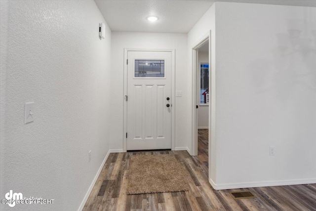 4125 E Zircon Cir, Wasilla, AK 99654 - entryway with wood finished floors and baseboards