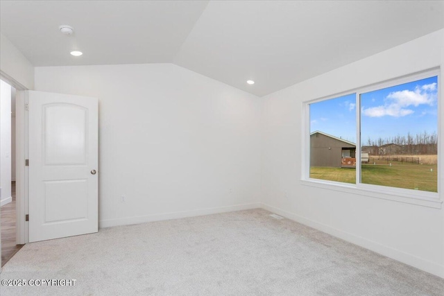 4125 E Zircon Cir, Wasilla, AK 99654 - carpeted empty room featuring lofted ceiling, a smoke detector, and recessed lighting