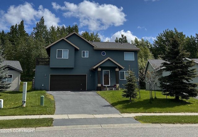 5785 Big Bend Loop, Anchorage, AK 99502 - traditional-style home featuring a garage, driveway, and a front lawn