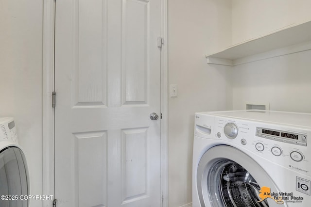 2321 Lusardi Point Cir, Anchorage, AK 99515 - laundry room featuring washer / clothes dryer