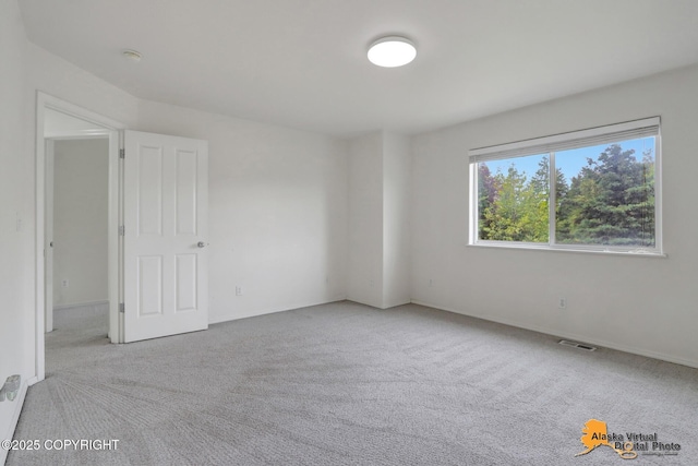 2321 Lusardi Point Cir, Anchorage, AK 99515 - carpeted spare room featuring baseboards